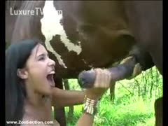Horse semen is swallowed by a brunette.